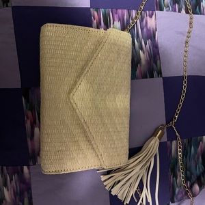 Off white straw clutch with straps